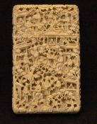 A 19th century Chinese ivory card case
Profusely carved with figures within a continuous landscape.