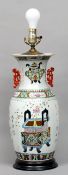 A 19th century Chinese porcelain vase
The flared rim above twin pierced handles, the main body