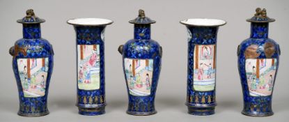 An 18th/19th century Canton enamel decorated five piece garniture
Comprising: two sleeve vases and