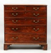 A George III mahogany chest of drawers
The moulded rectangular top above an arrangement of two short