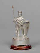 A silver model of a knight, hallmarked London 1988, maker's mark of Marlow Brothers
Modelled in