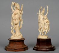 A pair of Indian ivory figures
Each carved as a deity, standing on a carved stepped wooden plinth