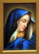 A 19th century Continental porcelain plaque
Enamel decorated with Madonna del Dito, after Carlo (