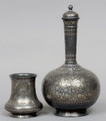 A 19th century Indian Bidriware bottle vase and cover
Of typical form; together with a Bidriware