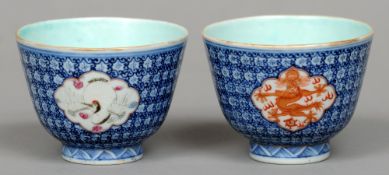 A pair of 19th century Chinese porcelain wine cups
Each decorated with crane and dragon vignettes on