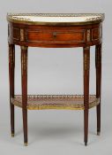 A 19th century ormolu mounted marble top demi-lune side table
The pierced brass three quarter