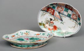 A Chinese porcelain dish
Of lobed form decorated with floral sprays; together with a Japanese