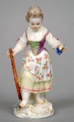 A Meissen figurine
Formed as a young girl cultivating grapes, the underside with blue crossed swords