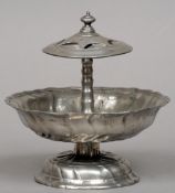 A pewter spoon rack, possibly 18th century, South German
The pierced top above the central column