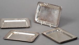 A set of six small Sterling silver trays
Each rectangular vessel decorated with Chinese bamboo