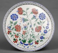 A Sarreguemines charger
Decorated in the Iznik taste with colourfully blossoming stems.  34 cms