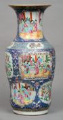 A 19th century Cantonese famille rose vase
The flared neck above the tapering bulbous body decorated