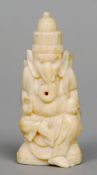 An Indian carved ivory figure of Ganesh
In typical pose.  10.5 cms high.   CONDITION REPORTS: