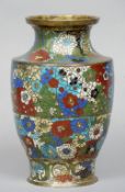 A 19th century Chinese cloisonne vase
Of baluster form decorated with stylised floral sprays.  30