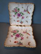 A pair of Chelsea style porcelain square dishes
Each with moulded wavy rim and decorated with floral