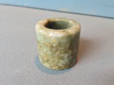 A Chinese carved jade archers ring
3.5 cms high.   CONDITION REPORTS:  Generally in good