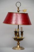 A bronze candle lamp
With triple sconces and painted adjustable tole ware shade.  55 cms high.