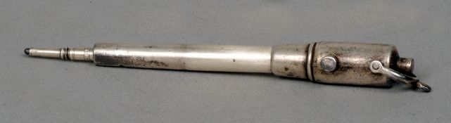 A late 19th/early 20th century silver propelling pencil, hallmarks indistinct
Formed as a cannon