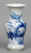 A Chinese porcelain blue and white vase
Of baluster form, decorated in underglaze blue with