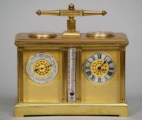 A lacquered brass cased combination desk timepiece, barometer, thermometer and compass
Of