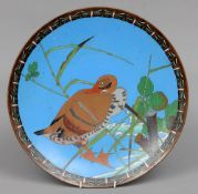 A Chinese cloisonne charger
Decorated with a duck.  36.5 cms diameter.   CONDITION REPORTS: