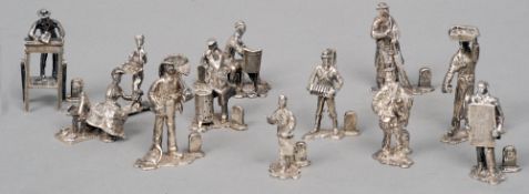 Thirteen silver Crys of London figural menu holders, 20th century, maker's mark of Thomas Charles