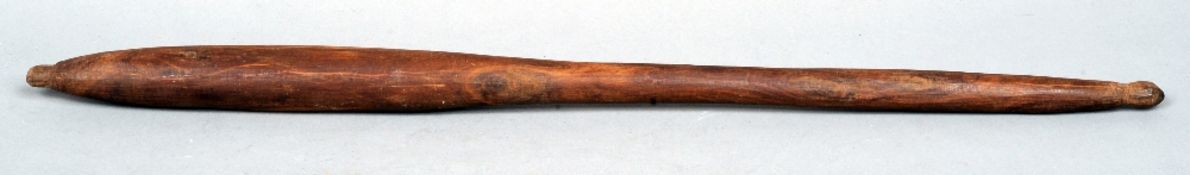 A 19th century African hardwood, possibly lignum vitae, throwing club
Of typical slender elongated