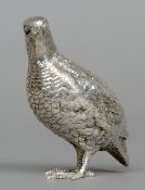 A silver model of a quail, hallmarked London 1975
Naturalistically formed standing.   12 cms high.