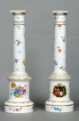 A pair of 19th century Berlin painted porcelain columns
Each decorated with floral sprays above a