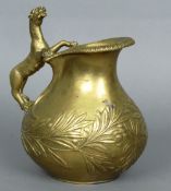 A 19th century Grand Tour bronze ewer
Of squat bulbous form with floral decoration and a leopard