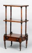 A 19th century mahogany whatnot
The two rectangular upper tiers supported by turned uprights above