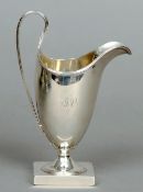 A George III silver cream jug, hallmarked London 1790, maker's mark of Peter and Jonathan Bateman