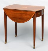 A George III mahogany Pembroke table
The crossbanded oval twin flap top centred with an inlaid