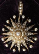 A Victorian unmarked gold and seed pearl pendant brooch
Of domed star form, the reverse with