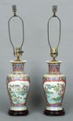 A pair Chinese porcelain vases (converted to lamps)
Each decorated with bats amongst fruit and