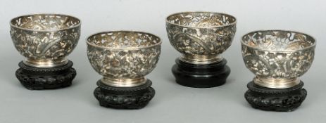 A set of four Chinese silver bowls, each with maker's mark of Wang Hing
Each pierced body
