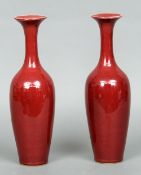 A pair of Chinese porcelain flambe glazed bottle vases
Each with flared rim, slender neck and