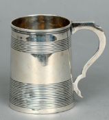 A George III silver Christening mug, hallmarked London 1801, makers mark indistinct
The