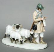 An early 20th century Meissen porcelain group by O. Tilz
Modelled as a shepherd and his flock,