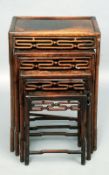 A late 19th/early 20th century Chinese carved hardwood quartetto nest of tables
Each of