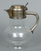 A Victorian silver  mounted  claret jug, hallmarked London 1881, maker's mark of RH RH
The domed lid