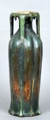 An Amphora Edda pottery vase
The drip  moulded rim incorporating four handles, the body