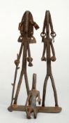 An unusual wrought iron tribal figural group
23 cms high.   CONDITION REPORTS:  Some rusting,