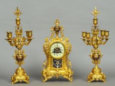 A 19th century cloisonne decorated ormolu clock garniture
The clock with cloisonne decorated ball