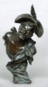 A 19th century bronze bust
Modelled as a woman wearing a hat and holding cherries in her teeth,