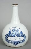 A mid 18th century Delft blue and white flagon of rare form
The hand painted cartouche with the