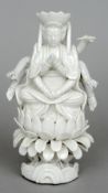 A 19th century Chinese blanc de chine model of a  multi-armed deity 
Formed seated in the lotus