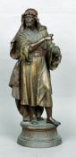 A 19th century painted and patinated spelter figure
Formed as a North African gentleman in typical