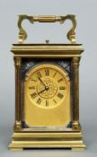 A 19th century lacquered brass cased repeating carriage clock
The gilt dial with Roman numerals