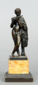 A 19th century Grand Tour bronze
Formed as a classical figure playing a flute, standing on a